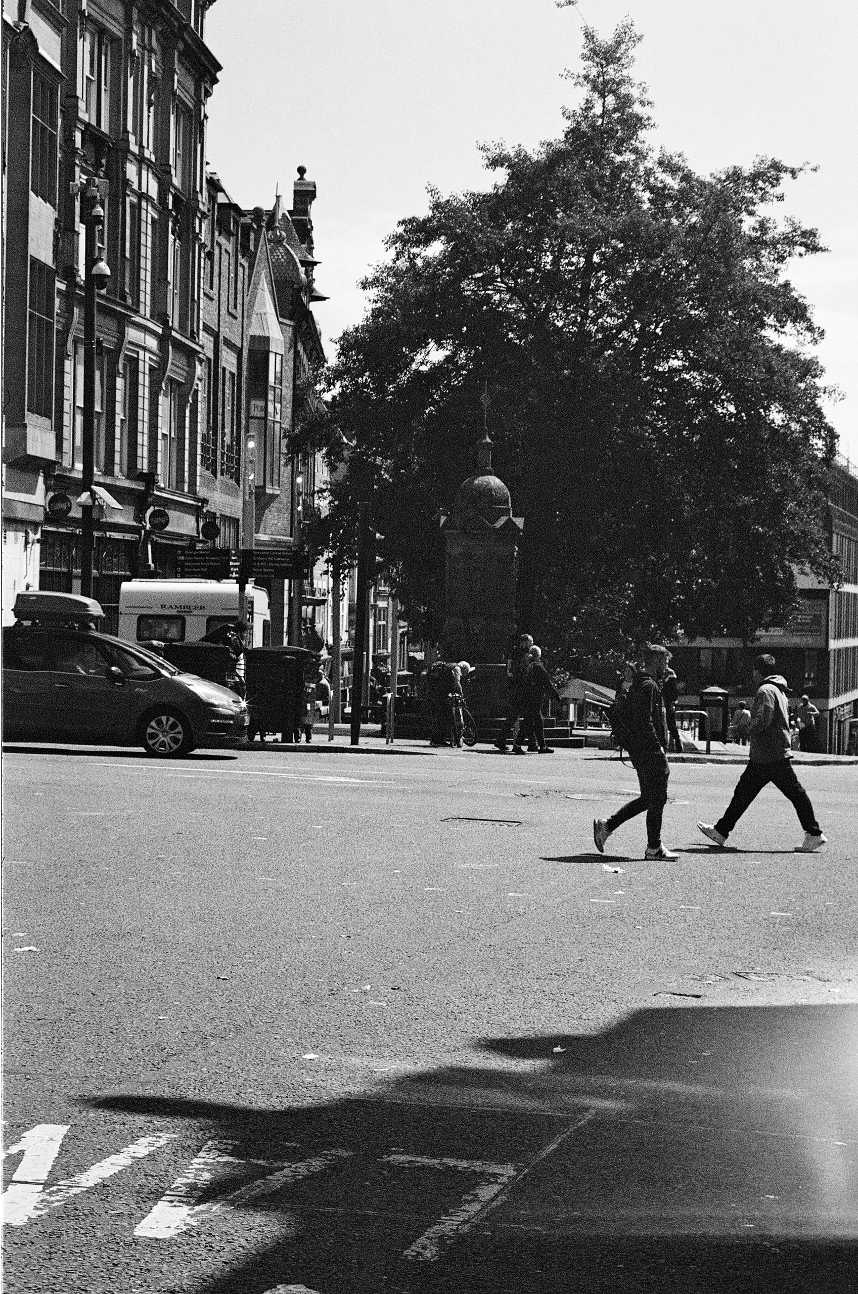 people crossing a pedestrian crossing newcastle 