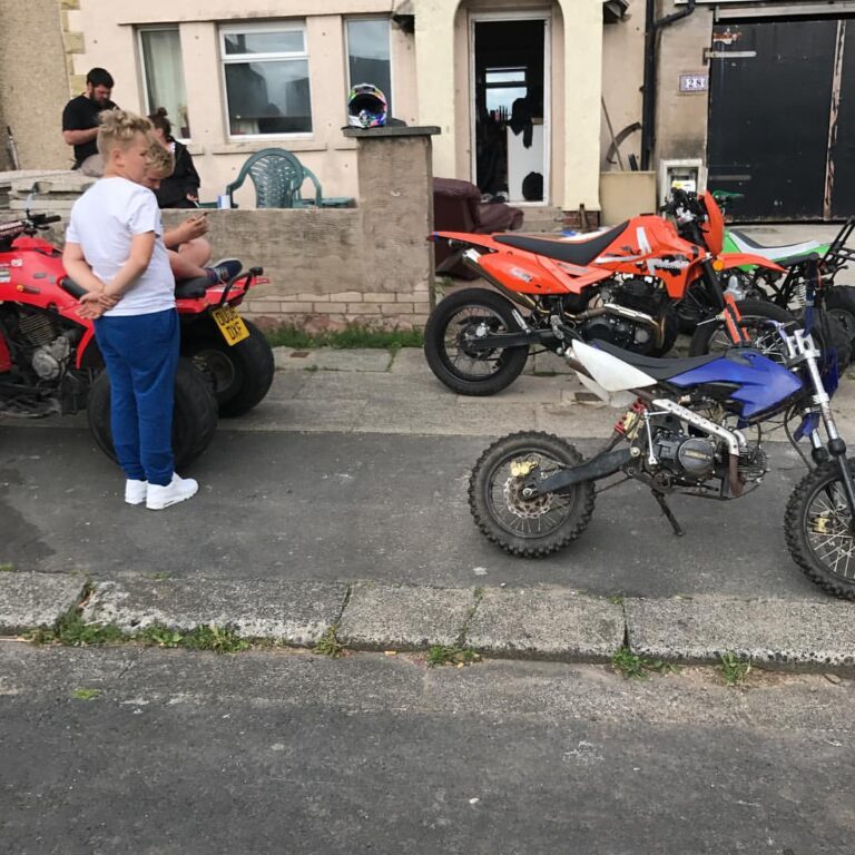 Playing bikes with the neighbors kids